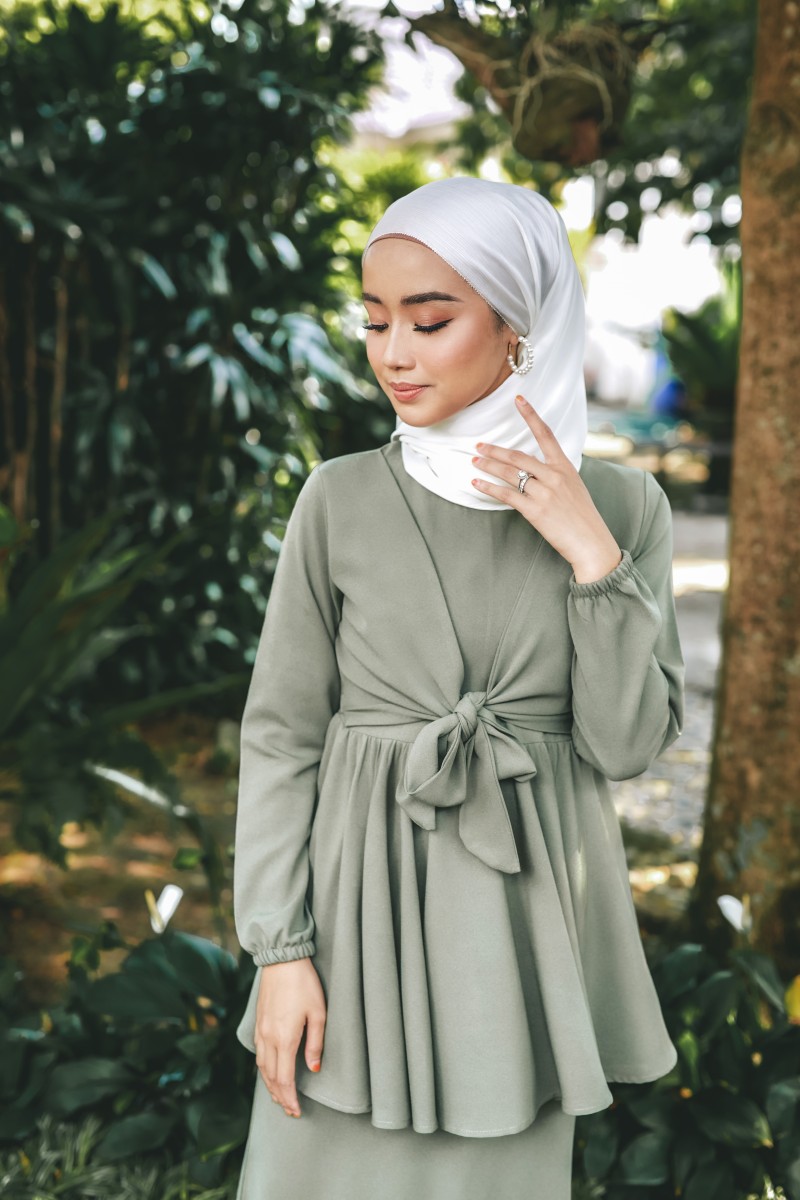 Peplum Orked In Sage Green